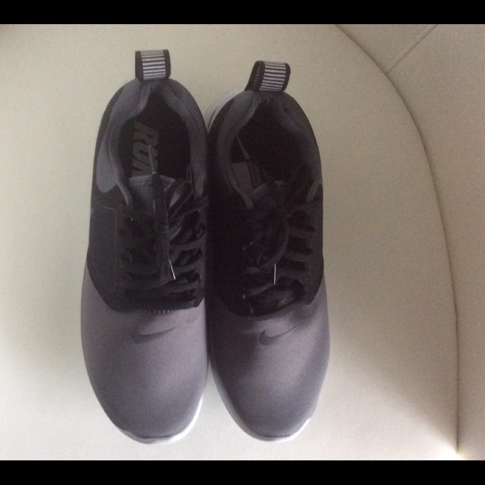 Dark gray and black Nike sneaker size 9